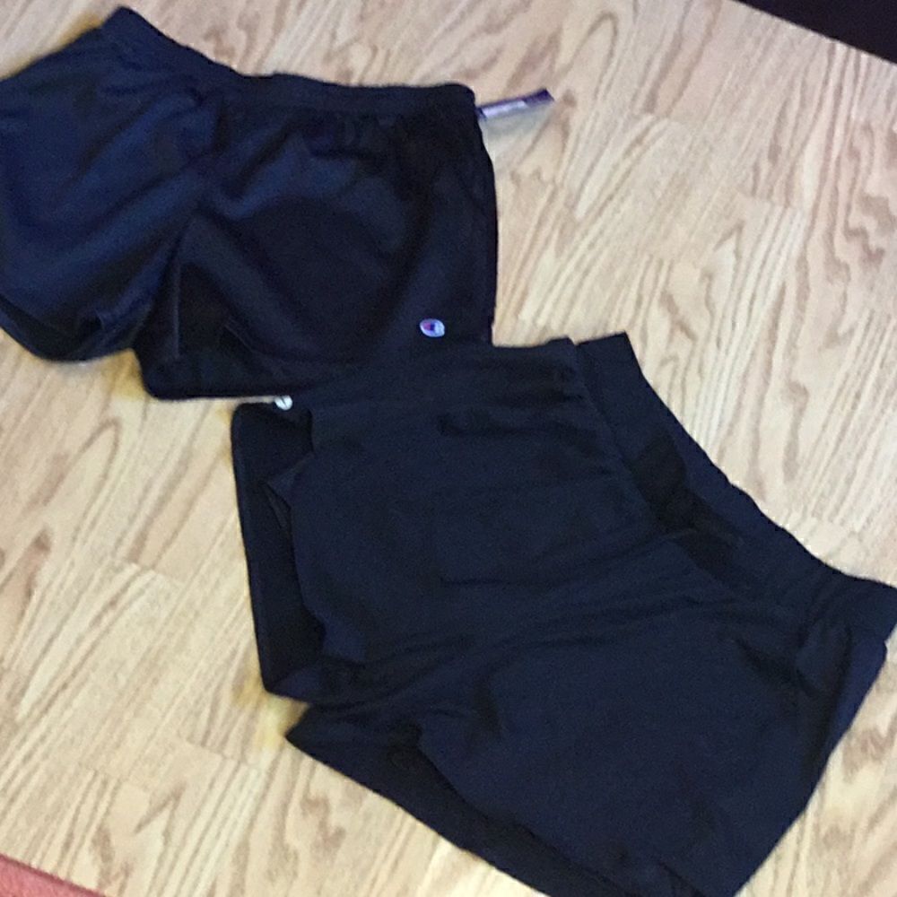 2 pair of athletic shorts in size medium, both black